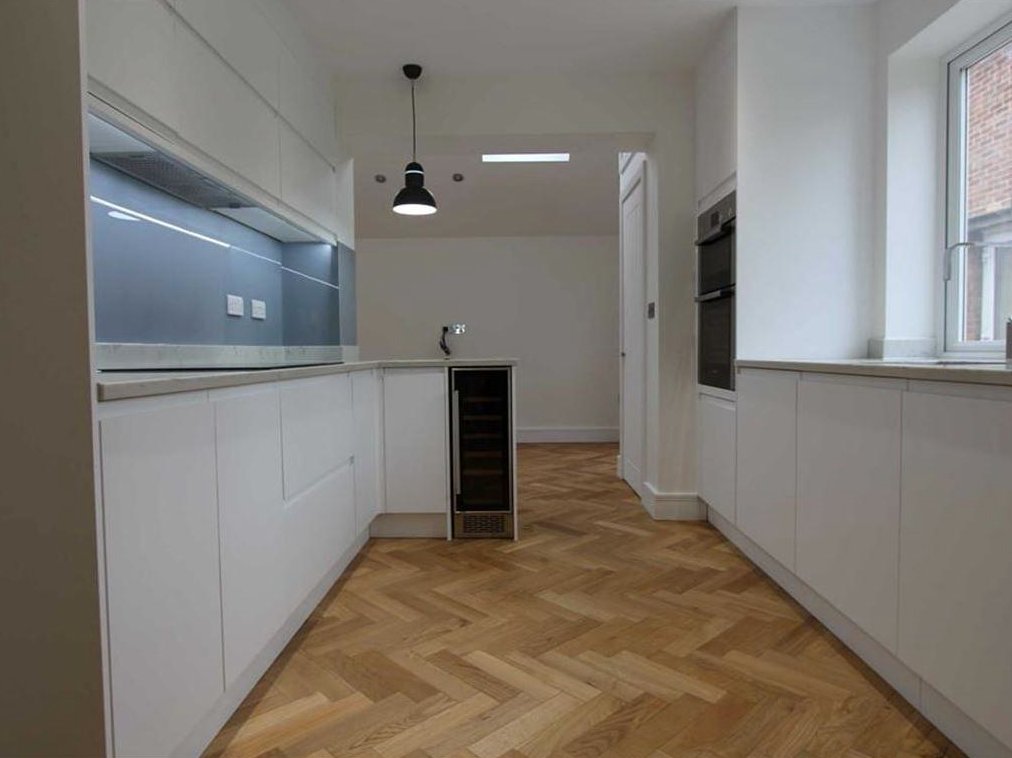 Kitchen with herringbone floor